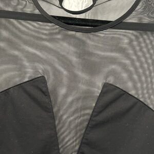 Unique Black Sheer Bodysuit
Round neck 
Long sleeve
Sz S